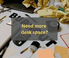 Cluttered office desk